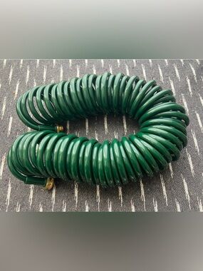 Coiled Green Heavy-Duty Garden Hose
